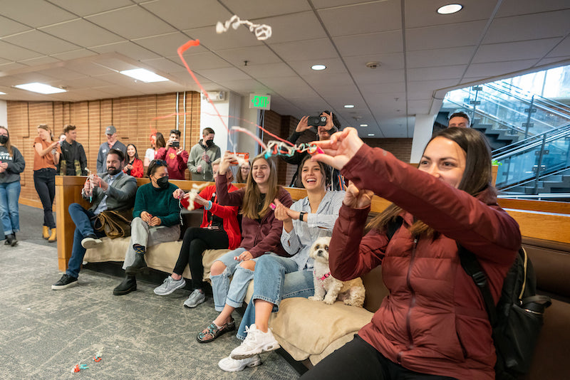 Photo of University of Utah students and staff celebrating Basic Needs Collective